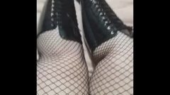 Pleaser Boots And Fishnet Pantyhose