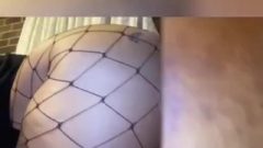 Female Rides Rubber Toy In Fishnets